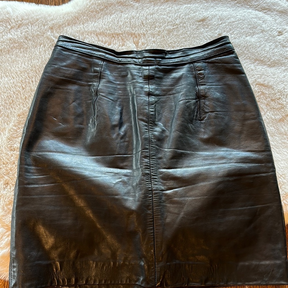 Leather skirt.